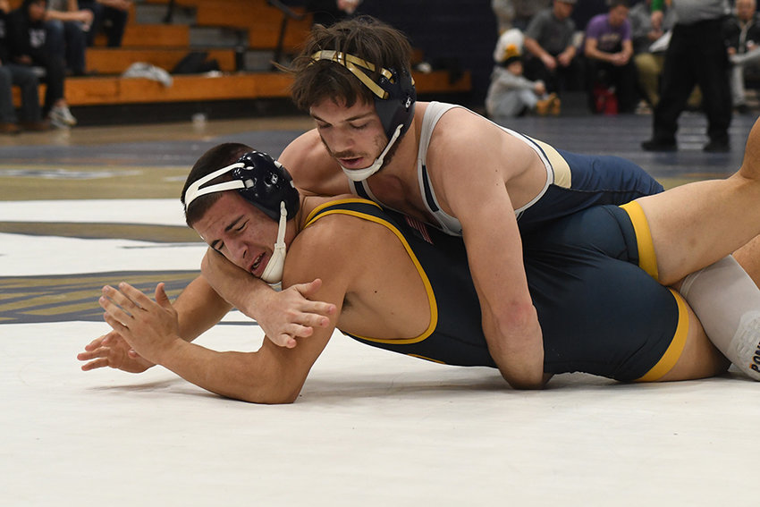 Newburgh's Joe Ponesse controls Shoreham-Wading River's Matthew Greco during a 172-pound bout at the Jeff Cuilty Duals on Saturday at Newburgh Free Academy.