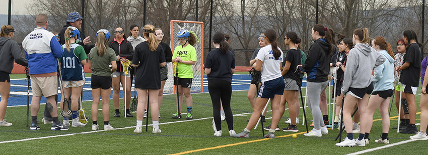 Wallkill girls&rsquo; lacrosse coach Frank Croce  talks to his team before Friday&rsquo;s practice on Robinson Field at Wallkill High School.