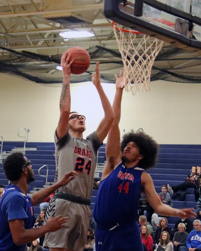 George Patsalos of Newburgh scored 17 points and 20 rebounds off the bench, in a recent win over Raritan Valley Community College that clinched a berth in the tournament.