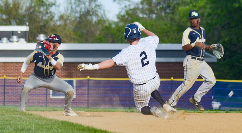 Pine Bush&rsquo;s Jack Taylor slides into second base as Newburgh second baseman Tyler Martin takes the throw and shortstop Joe Alicea looks on during an OCIAA crossover baseball game on May 13, 2022, at E.J. Russell Elementary School in Pine Bush.