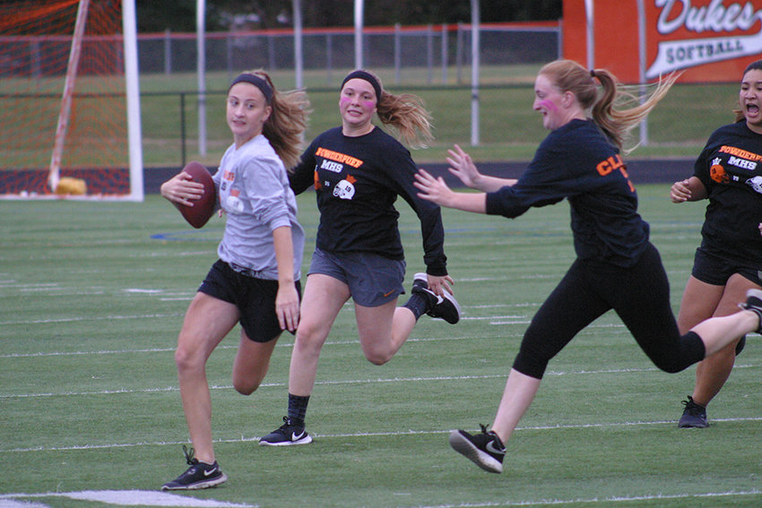 The &lsquo;powder puff&rdquo; flag football game, once a homecoming week ritual, has blossomed into a varsity sport.