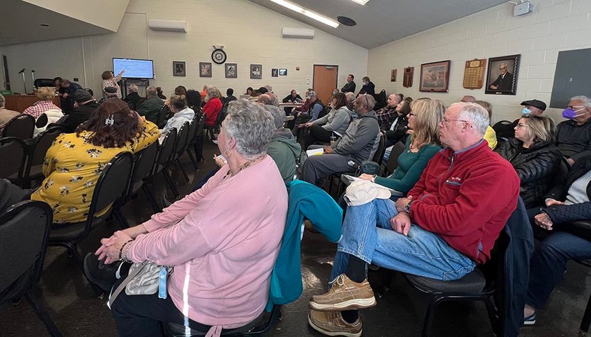 Residents listen as rates and other charges are discussed during the presentation by Central Hudson.