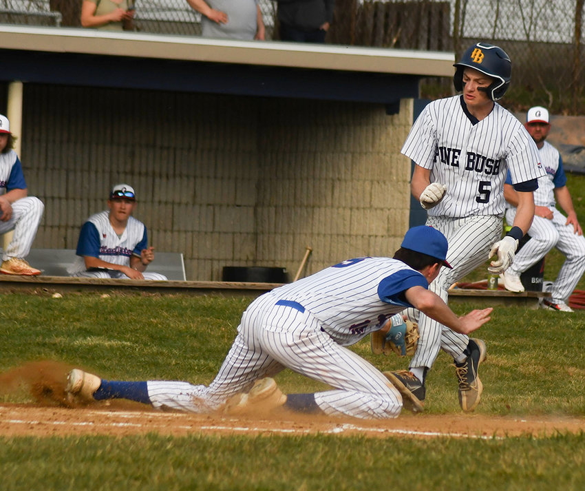Pine Bush&rsquo;s Matt Boffalo is tagged out at home plate by Goshen pitcher Tyler Kropp during a non-league baseball game on April 4 at Mataraza Field in Pine Bush.
