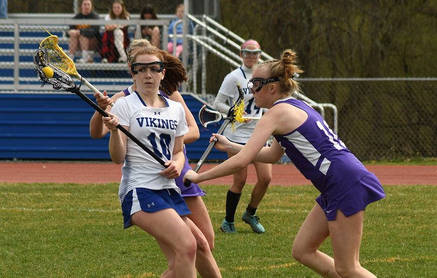 Valley Central&rsquo;s Kiera McPhillips tries to advance as she is blocked off by Warwick&rsquo;s Kiera Larney defends during Thursday&rsquo;s league girls&rsquo; lacrosse game at Valley Central High School in Montgomery.