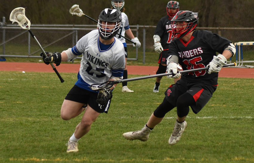 Valley Central&rsquo;s Bryson Antal carries the ball as Red Hook&rsquo;s Gavin Campolong defends during Thursday&rsquo;s boys&rsquo; lacrosse game at Valley Central High School in Montgomery.
