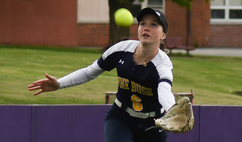 Pine Bush center fielder Kayla Suleski chases a fly ball during Wednesday&rsquo;s OCIAA crossover softball game at Monroe-Woodbury High School in Central Valley.