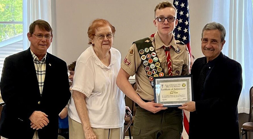 Shown from L-R: Commissioner James Presutti, Town Councilwoman Elizabeth Greene, Eagle Scout Joseph Dubaldi and Town of Newburgh Supervisor Gil Piaquadio at the Eagle Scout Court of Honor Ceremony.