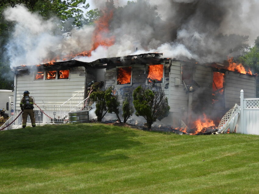 Firefighters battled a house fire, Tuesday afternoon at Creek Run Road in the Town of Newburgh
