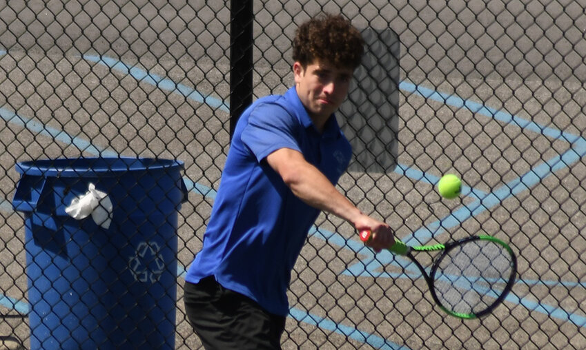 Wallkill&rsquo;s J.J. Wagner responds with a backhand during Wednesday&rsquo;s MHAL boys&rsquo; tennis championships at Franklin D. Roosevelt High School in Hyde Park.