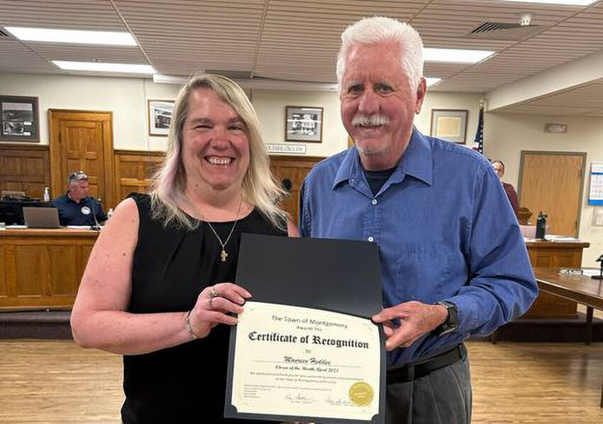 Maureen Hedden received her &ldquo;Citizen of the Month&rdquo; certificate from Town Supervisor Ron Feller.