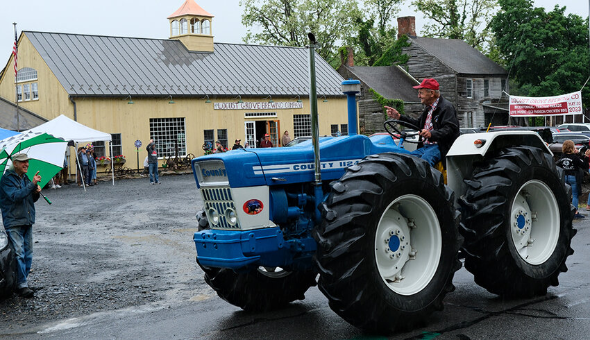 Local area farmers honored the Kents with a tractor parade that culminated at their Locust Grove Brewing Company in Milton.