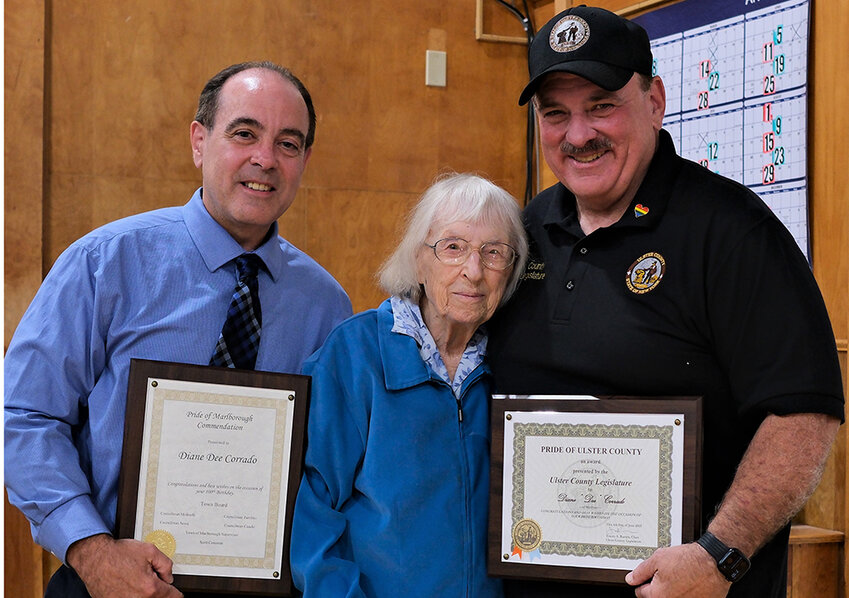 Diane Dee Corrado was presented with a Pride of Ulster County Award by Ulster County Legislator Tom Corcoran (r.) and with a Pride of Ulster County Award from Supervisor Scott Corcoran in honor of her 100th birthday.