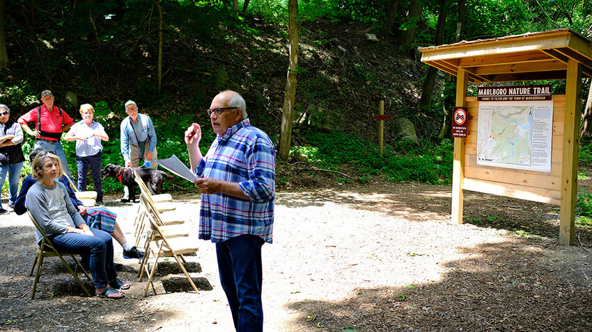Howard Baker stands in front of the Nature Trail kiosk to speak about Tony Falco&rsquo;s drive and dedication to create the trail and his love for the Town of Marlborough.