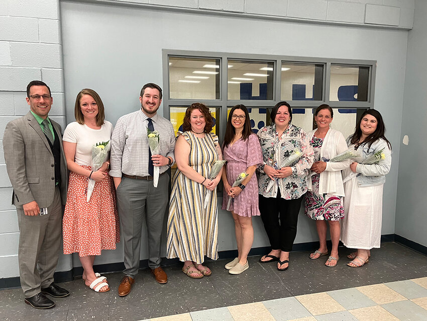 From left to right: Highland Elementary School (HES) Principal Ian MacCormack stands with HES tenure recipients Kayla Weber, Daniel Sommerfeldt, Kristina Hughes, Sara Goodwin, Casey Gallagher, Kristen Bove and Emily Bacher.