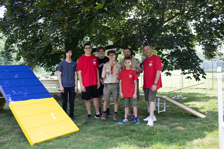Nicholas Zica with his father, Dan Zica, fellow scouts and others.