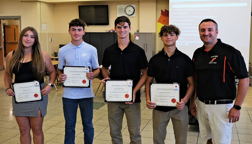 Last week, the Marlboro School District Administration and School Board honored their Outstanding Student Athletes in Track and Field for 2023: Pictured L-R: Juliana Juras a High School Discus Champion and performed in Shotput and the Hammer Throw; Daniel Maher, 4x 100 Meter Relay Team; Colin Robertson, for the 100 and 200 Meter Dash and 4x 100 Meter Relay Team; Sean Robertson, for Pole Vault and 4x 100 Meter Relay Team; and Track &amp; Field Coach Peter Carofano.