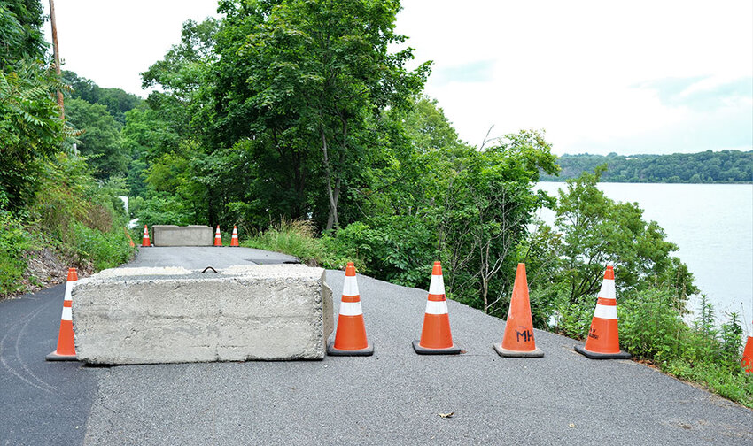 Two barriers have been placed at the foot of Maryanne and Patrick  Quick&rsquo;s driveway on Old Indian Trail to prevent through traffic.