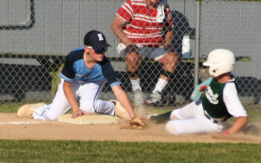 Town of Newburgh-New Windsor second baseman Matt Bonura tags out a Cornwall runner during Wednesday&rsquo;s District 19 Majors baseball game at Port Jervis Little League.