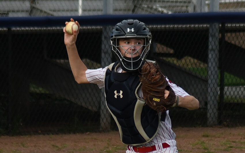 Newburgh catcher Conor Smith makes a throw to first base during Wednesday's Greater Hudson Valley Baseball League 14U game at Delano-Hitch Park in Newburgh.