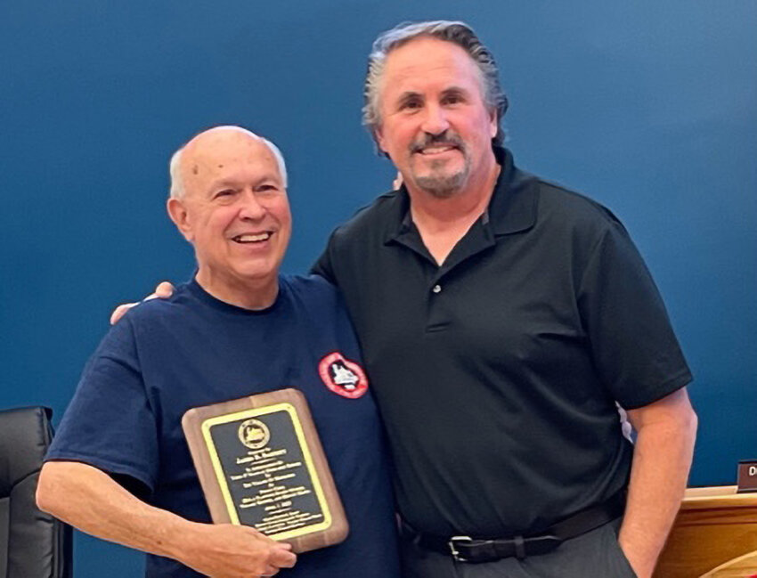 Former Maybrook Trustee Jim Barnett (l.) received a plaque from Mayor Dennis Leahy in appreciation for his many years of service to the village.