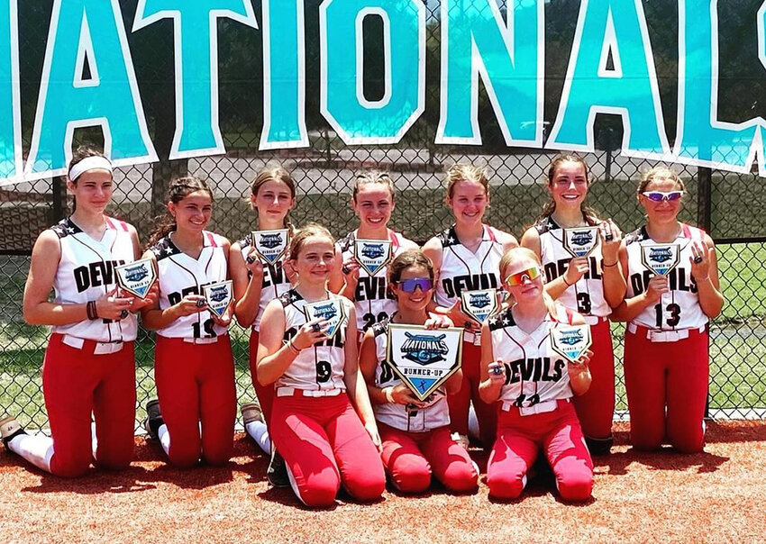 The Montgomery Devils are shown with their runner-up plaque and awards after placing second out of 30 teams at Youth Softball Nationals in Myrtle beach. The Devils are: from left, front: Amelia Bavolar, Kenzie Castro, Autumn Gove; back: Samantha Maleck, Gabrielle Torre, Ryan Keller, Addison Freiberger, Caileigh Regan, Alana Hayes and Parker Mullarkey.