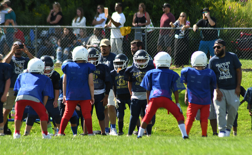 Town of Newburgh Goldbacks line up against Goshen during Saturday&rsquo;s Orange County Youth Football League Division 1 scrimmage at Lasser Park in Salisbury Mills.