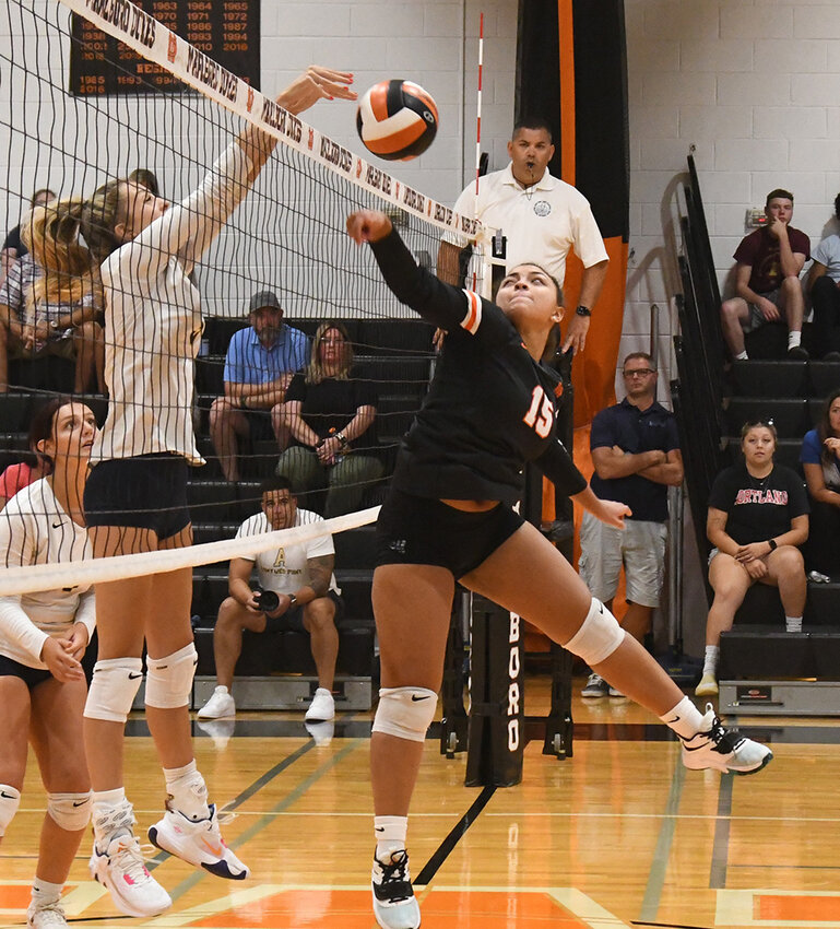 Pine Bush&rsquo;s Taylor Jennings blocks a ball sent her way by Marlboro&rsquo;s Jaedyn Lunsford during a non-league volleyball match on Sept. 5 at Marlboro High School.