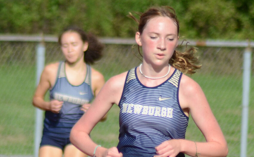 Newburgh's Mary Jane Politi runs the girls' race as she is followed by teammate Natalia Sweat during an OCIAA cross-country meet on Sept. 13, 2022, at Valley Central High School in Montgomery.