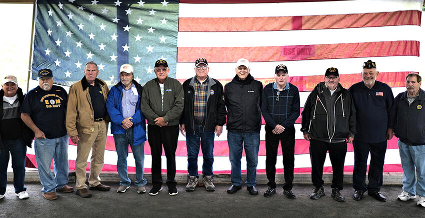 After a ceremony in honor of Vietnam Veterans in Marlborough, they posed for a group picture against the American Flag as a backdrop. Pictured (l. &ndash; r.) William Elgee: Joe Schiavone: William Brown: John Ursino: Joe Freeborn: Karl Fred: Brian Collins: Fred VanAmburgh: Ken Brooks: Tom Schroeder and Richard Palermo.
