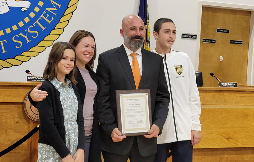 James Ventriglia, shown with his family, was honored at the Marlborough Town Board meeting on Monday.