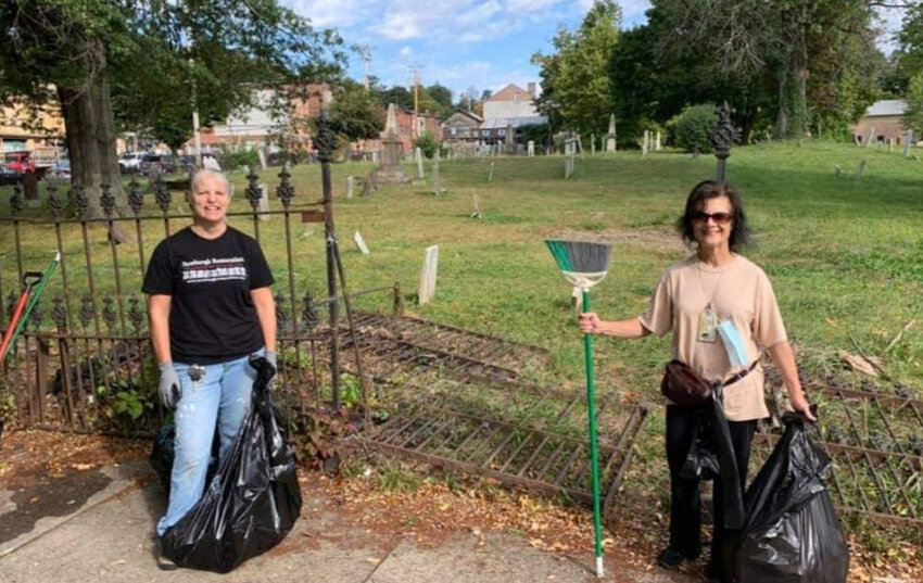 Maggie Mehr (l.) and Linda Jansen with trash bags in hand keep Newburgh beautiful during one of their regular clean ups in the City of Newburgh.