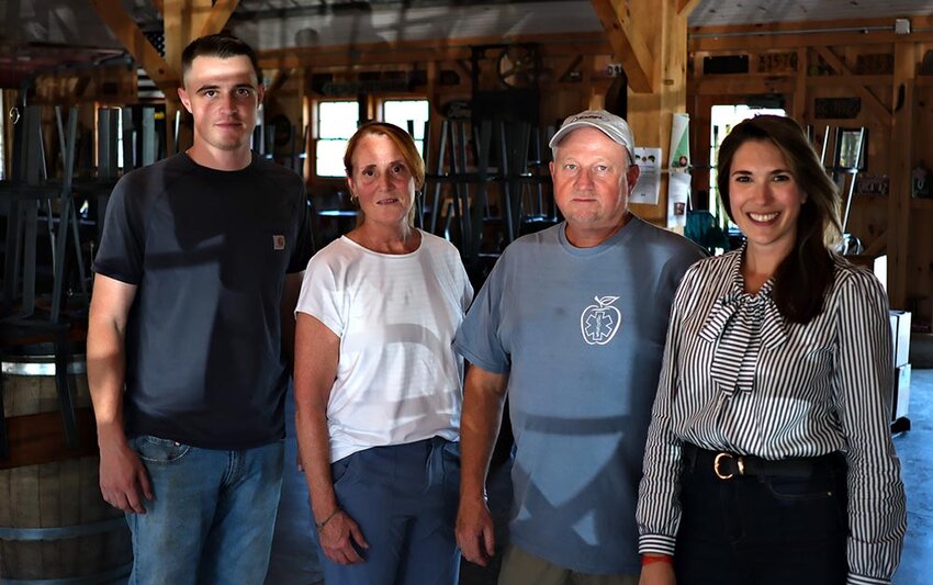 State Senator Michelle Hinchey visited the Locust Grove Fruit Farm in Milton to present the Kent family with a proclamation in honor of their two centuries as an operating farm. Pictured (l. r.) Sawyer Kent, Peggy Kent, James Kent and Hinchey.