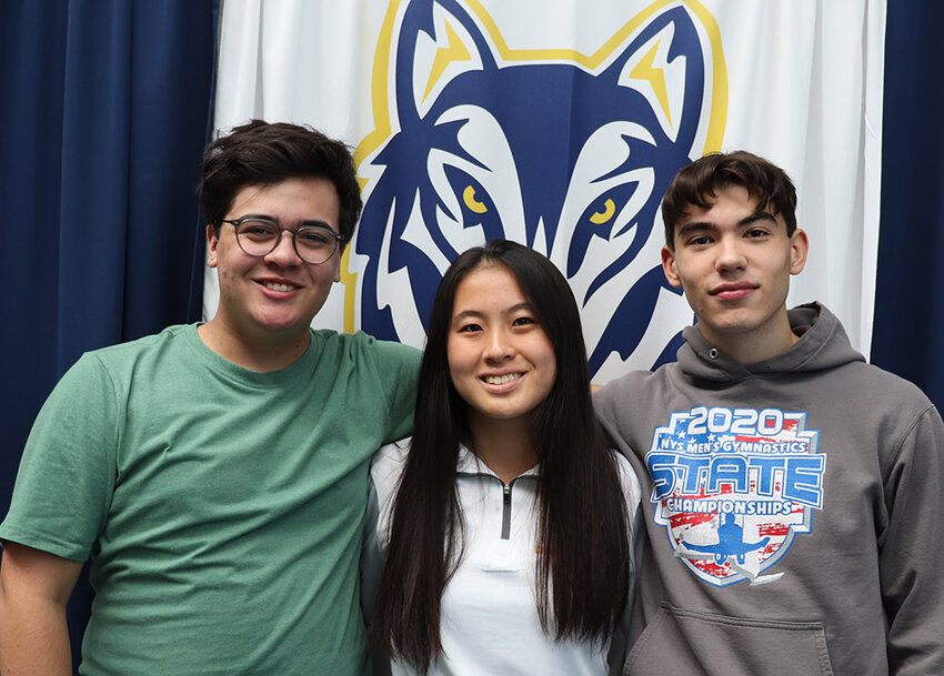 Highland High School senior Alice Dong (center) has been named a semifinalist in the prestigious National Merit Scholarship competition. Nicholas Fiorese (left) and Alexander Papazov (right) have been recognized as Commended Students in the same program.