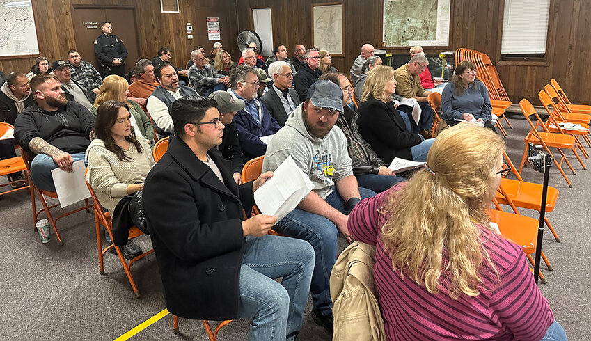 Large audience at Wednesday’s Town of Plattekill Board meeting making its feelings known about a proposed local law that would ban motor vehicle racing in the entire town.