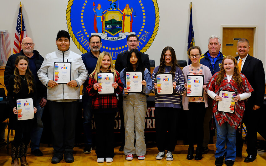 Last week, seven students received recognition from the Marlboro Milton Lions Club for their submissions to their Peace Poster contest. Pictured L-R Honorable Mention went to Adeline Appler, Gregory Artero, Ella Bogaczyk, Kimberly Luis, Kara Morehead, Alyssa Scaturro, and Ella Loupe received an Achievement Award. In the back row, Lions Club President Jerry Wein, club secretary Frank Carfarcio, Marlboro Superintendent Michael Rydell and club members Stephen Jennison and Frank Milazzo.