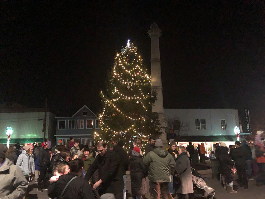 The celebration&rsquo;s Christmas tree shines in the square