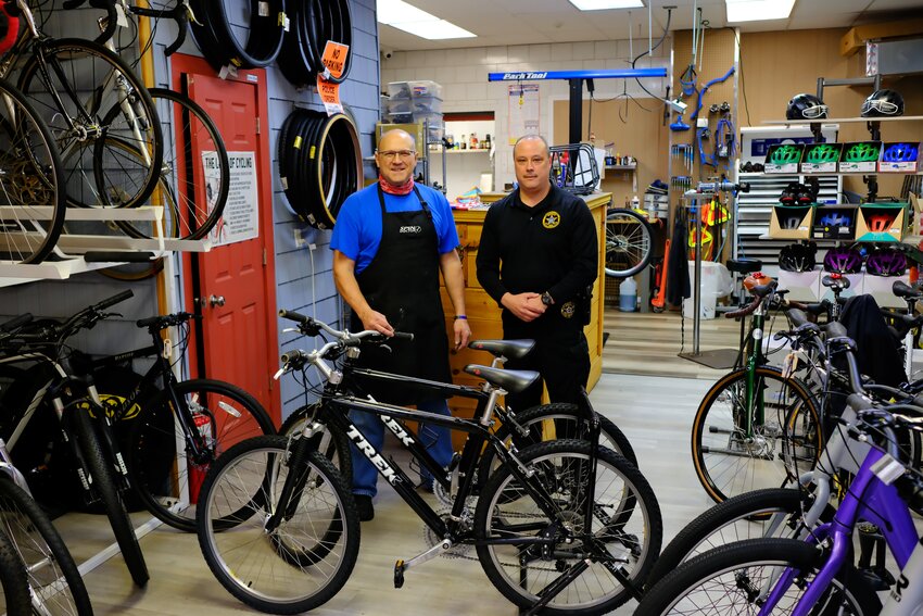 Mark Elia [L], of GPAs Bike Shop, donated two new Trek bikes to Lloyd Police Chief James Janso for use by his department&rsquo;s bike patrol officers, who cover the Hudson Valley Rail Trail and the Walkway Over the Hudson.