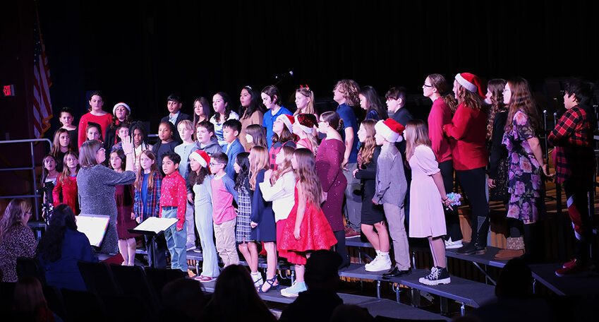 The 5th grade Chorus sang &lsquo;No Elephant&rsquo; &lsquo;Light of Hope, A Song of Peace&rsquo; and &lsquo;Mele Kalikimaka&rsquo;
