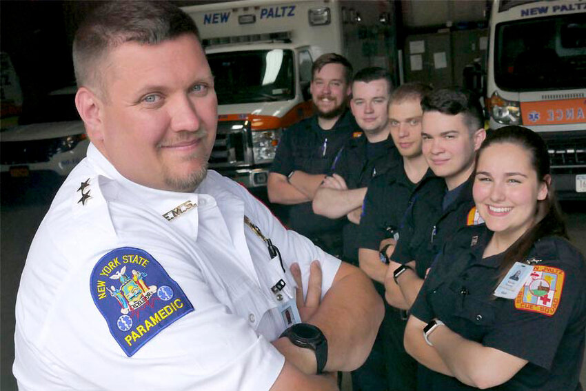 Chief Matthew Goodnow poses with members of his rescue team.
