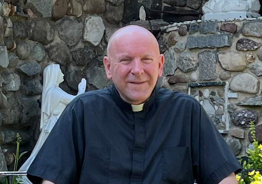 Fr. Bill Damroth in the prayer grotto of Saint Francis Church in Newburgh, shortly before his transfer to Port Jervis in the summer of 2022.