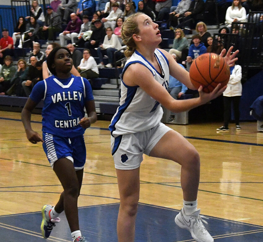 Wallkill&rsquo;s Aoife Brady goes up for a shot as Valley Central&rsquo;s Breonna Curtis Wright trails the play during Saturday&rsquo;s Wallkill tournament opening round girls&rsquo; basketball game at Wallkill High School.