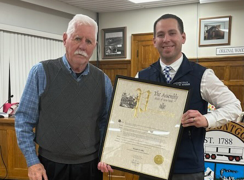 Former Town of Montgomery Supervisor Ron Feller (l.) with his immediate predecessor, Assemblyman Brian Maher, who presented him with a copy of a resolution honoring his service.