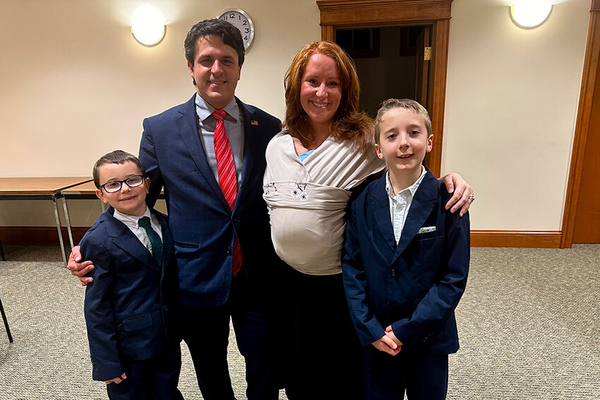 New Town of Shawangunk Supervisor Ken Ronk Jr. poses with his family after being sworn in on Friday at the Town Hall. Left to right: son Everett, wife Samantha and son Jackson.