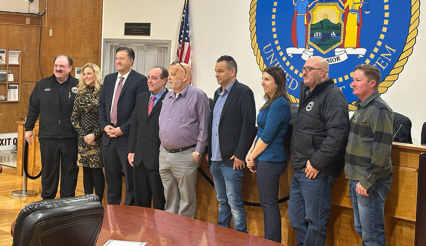 Newly sworn-in &ndash; and existing &ndash; members of local government in Marlborough take a bow following the January 3 swearing-in ceremony. Shown (L-R) are Ulster County rep Tom Corcoran, Town Clerk Colleen Corcoran, Town Justice Dan Jackson, Town Supervisor Scott Corcoran, Councilman Ed Molinelli, Councilman Dave Zambito, Councilwoman Sherida Sessa, Highway Superintendent John Alonge, and Deputy Supervisor Gael Appler, Jr.