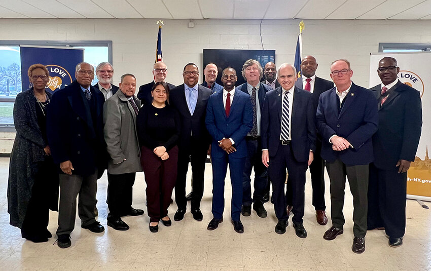 Robert McLymore (center) joins the ranks of city, regional and state elected officials and community leaders as he embarks on his political journey.