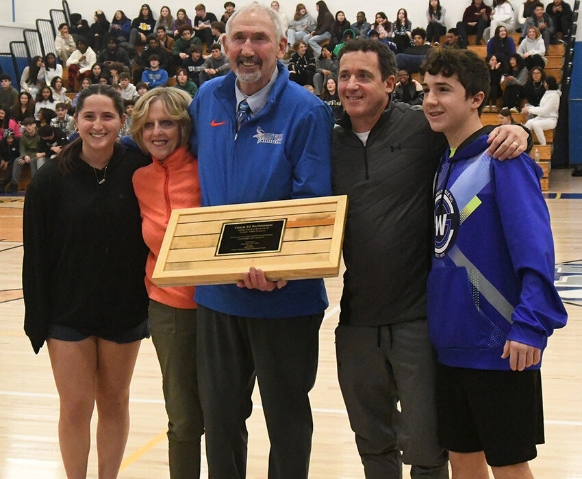 Longtime coach Ed Rechtorovic poses with his family after being recognized for nearly 60 years of service to the Valley Central boys&rsquo; basketball program before the Vikings&rsquo; game against the Cornwall Dragons on January 2 at Valley Central High School in Montgomery.