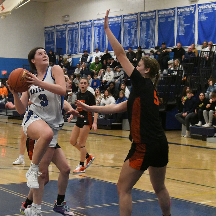 Wallkill&rsquo;s Gabby Gaultiere goes up for a shot as Marlboro&rsquo;s Hannah Polumbo defends during Thursday&rsquo;s MHAL girls&rsquo; basketball game at Wallkill High School.