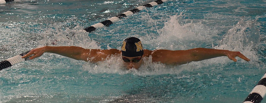 Newburgh&rsquo;s Angelo Reade swims the 100-yard butterfly during Friday&rsquo;s OCIAA boys&rsquo; swimming and diving meet at Newburgh Free Academy.