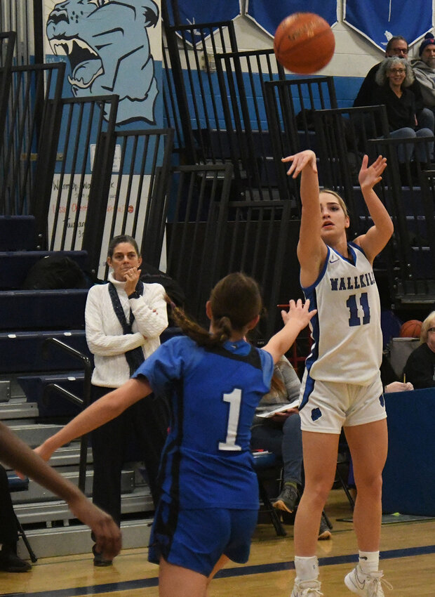 Wallkill’s Zoe Mesuch shoots over Rondout Valley’s Helena Molitaris during Thursday’s MHAL girls’ basketball game at Wallkill Senior High School.