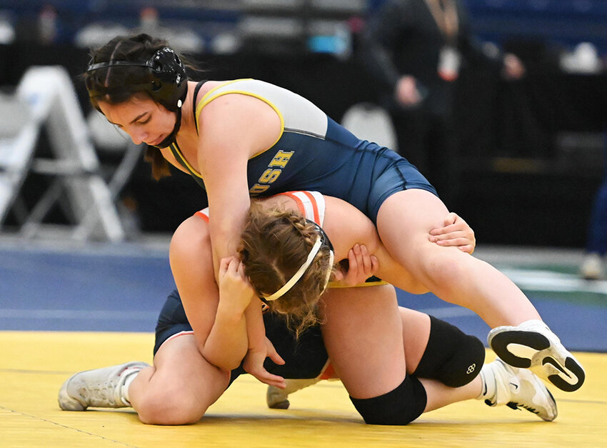 Brooke Tarshis records a last-second takedown against Seaford’s Ashley Diaz to win the third place at the NYSPHSAA girls’ wrestling invitational in Syracuse on Friday.